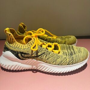 Women’s Yellow and Black Knit Sneakers
